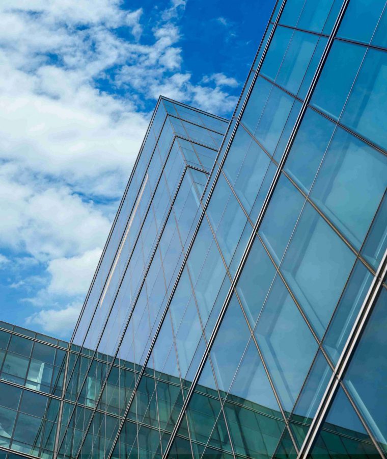 low_angle_view_modern_glass_office_building_abstract_background_11zon low_angle_view_modern_glass_office_building_abstract_background_11zon